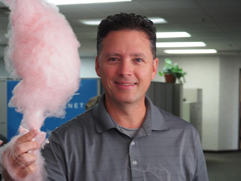 Rick Riordan with cotton candy for Mark Iannuzzi's Birthday