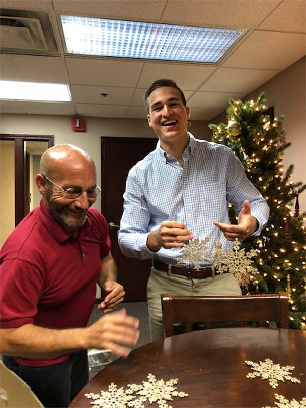 Sam Price and Jim Pixley Christmas decorating
