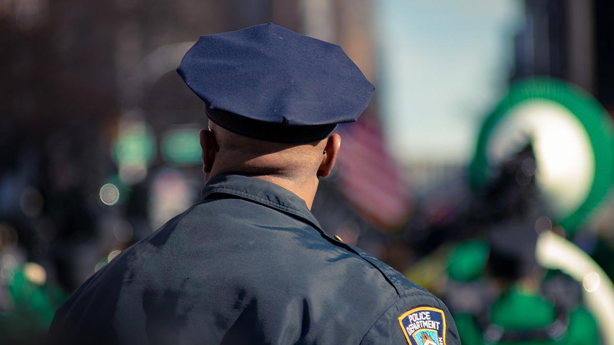 over the shoulder of police officer