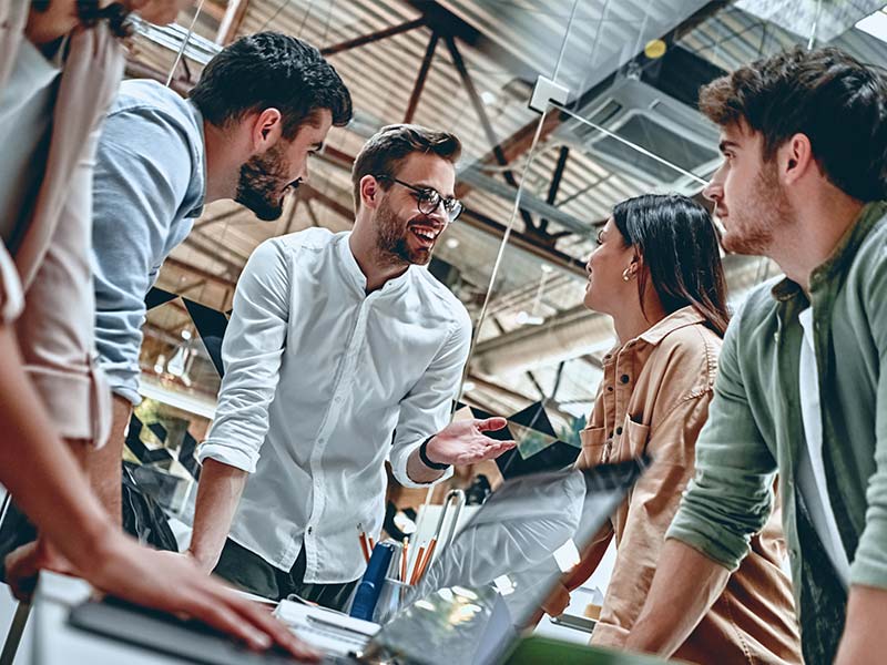 small startup talking during meeting